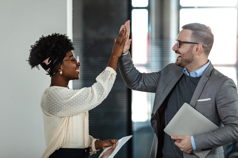 Business people high 5